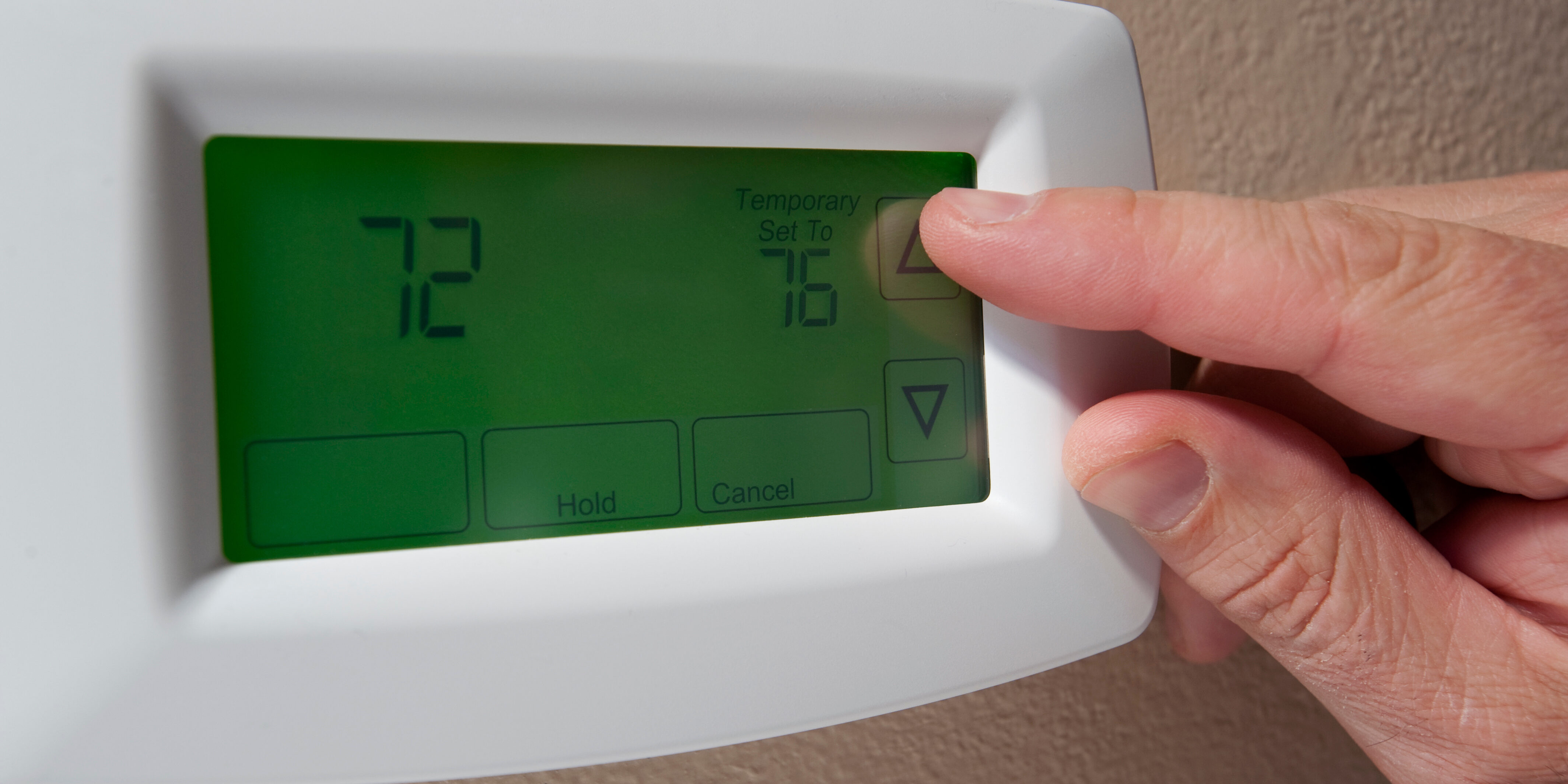 Changing the temperature on a digital thermostat